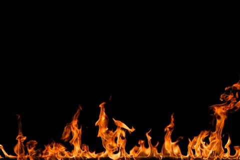 Fire flames on black background. Stock Photos
