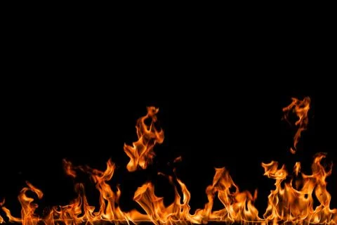 Fire flames on black background. Stock Photos