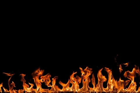 Fire flames on black background. Stock Photos