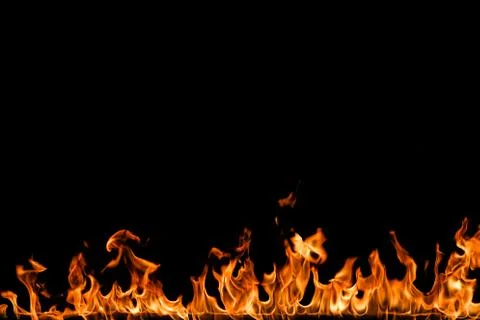 Fire flames on black background. Stock Photos