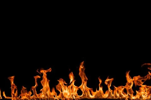 Fire flames on black background. Stock Photos