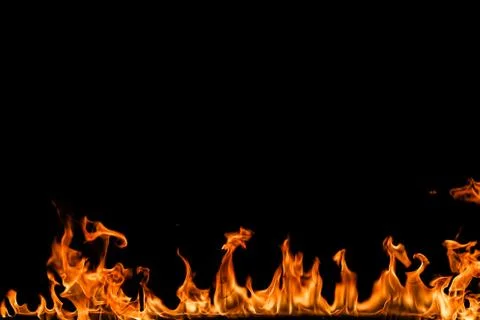 Fire flames on black background. Stock Photos