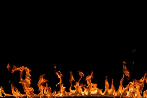 Fire flames on black background. Stock Photos