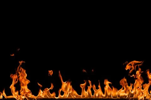 Fire flames on black background. Stock Photos