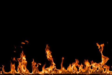 Fire flames on black background. Stock Photos