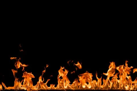 Fire flames on black background. Stock Photos