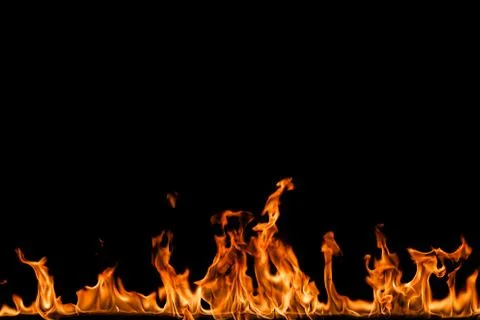 Fire flames on black background. Stock Photos