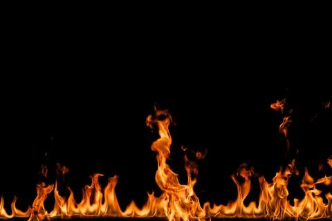 Fire flames on black background. Stock Photos