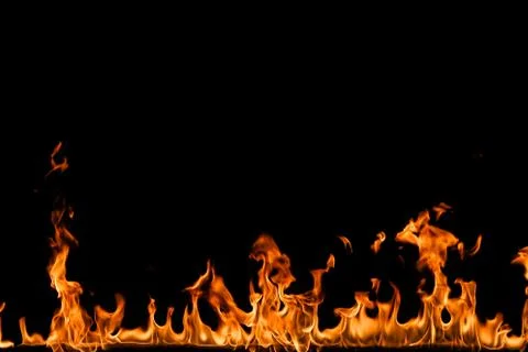 Fire flames on black background. Stock Photos