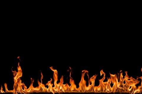 Fire flames on black background. Stock Photos