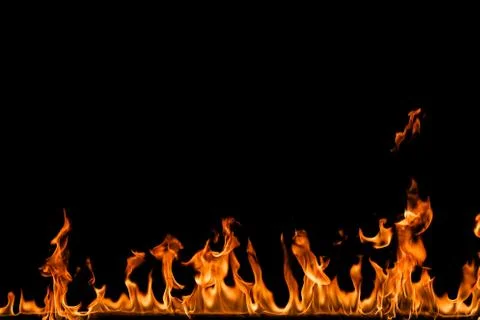 Fire flames on black background. Stock Photos