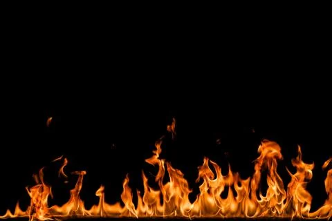 Fire flames on black background. Stock Photos