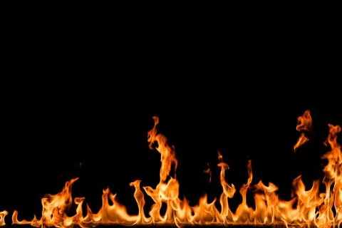 Fire flames on black background. Stock Photos