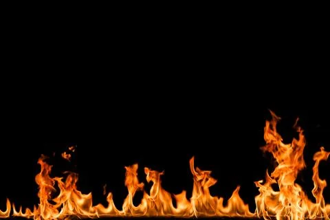 Fire flames on black background. Stock Photos