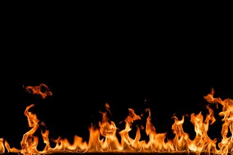 Fire flames on black background. Stock Photos