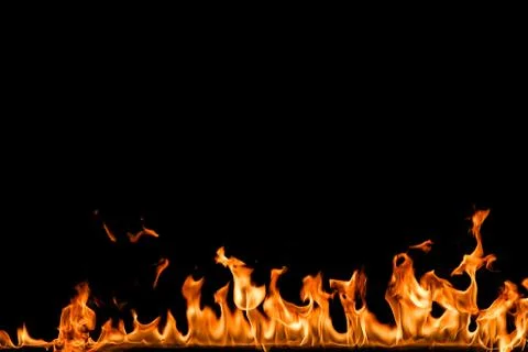 Fire flames on black background. Stock Photos