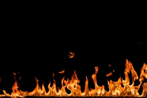 Fire flames on black background. Stock Photos