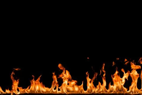 Fire flames on black background. Stock Photos