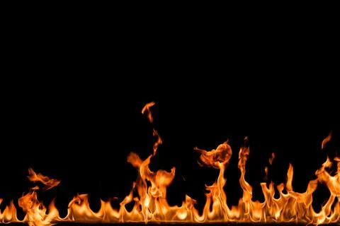 Fire flames on black background. Stock Photos