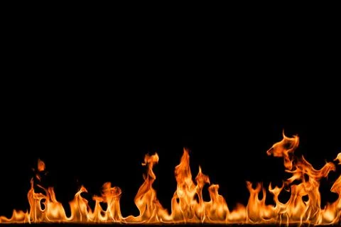 Fire flames on black background. Stock Photos
