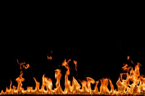 Fire flames on black background. Stock Photos