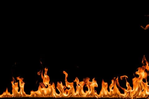 Fire flames on black background. Stock Photos