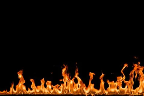 Fire flames on black background. Stock Photos