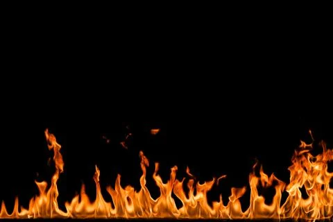 Fire flames on black background. Stock Photos