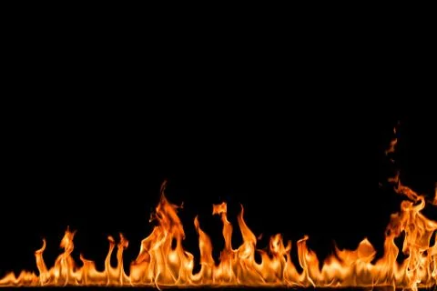 Fire flames on black background. Stock Photos
