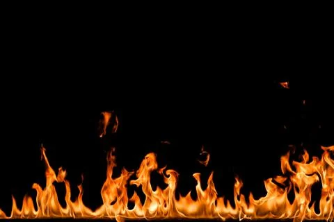 Fire flames on black background. Stock Photos