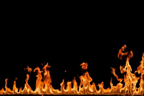 Fire flames on black background. Stock Photos
