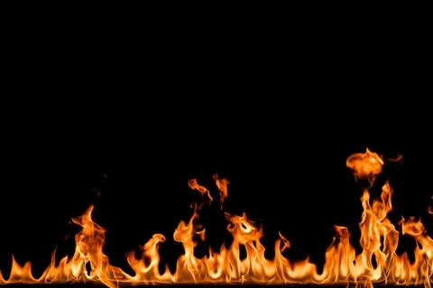 Fire flames on black background. Stock Photos