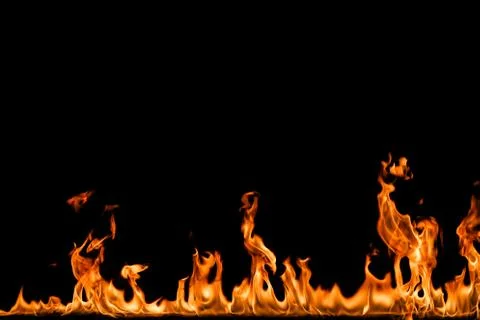 Fire flames on black background. Stock Photos