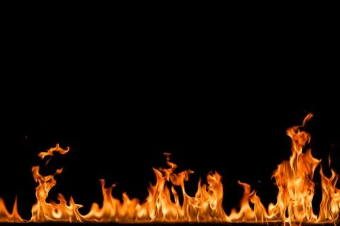 Fire flames on black background. Stock Photos