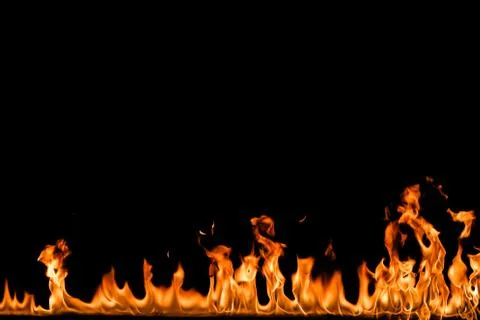 Fire flames on black background. Stock Photos
