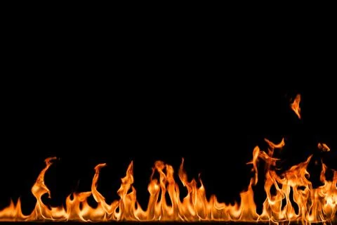 Fire flames on black background. Stock Photos