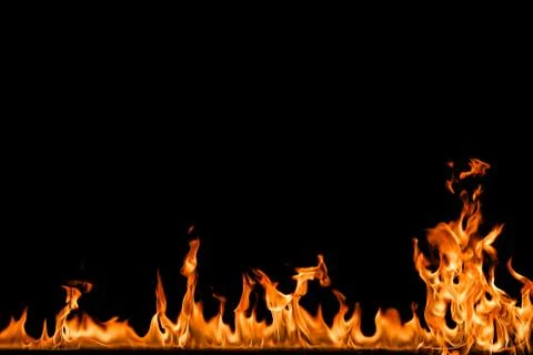 Fire flames on black background. Stock Photos