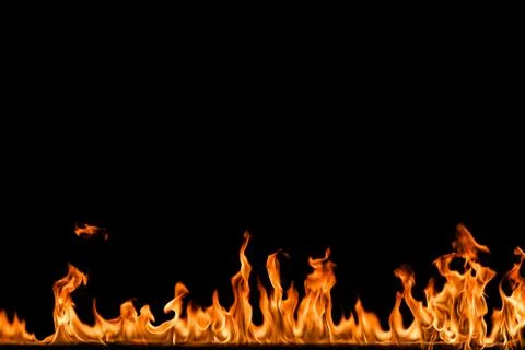 Fire flames on black background. Stock Photos