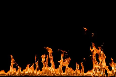 Fire flames on black background. Stock Photos