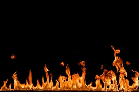 Fire flames on black background. Stock Photos