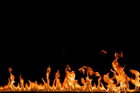 Fire flames on black background. Stock Photos