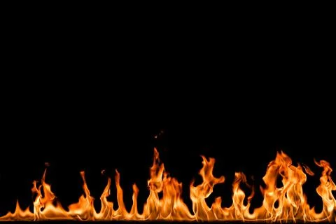 Fire flames on black background. Stock Photos