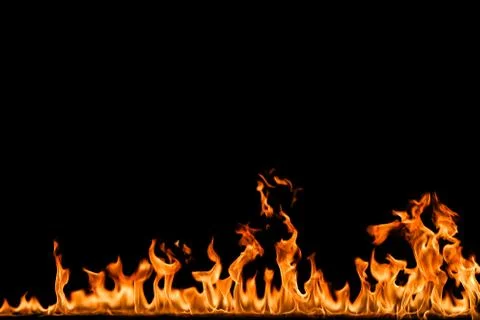 Fire flames on black background. Stock Photos