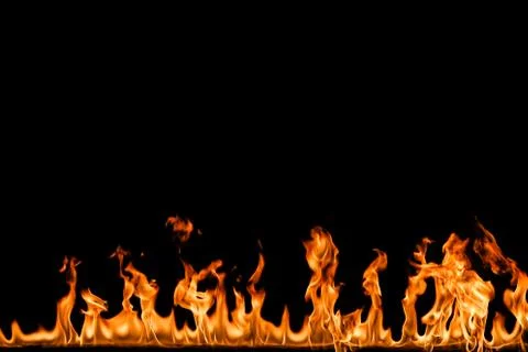 Fire flames on black background. Stock Photos