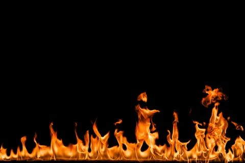 Fire flames on black background. Stock Photos