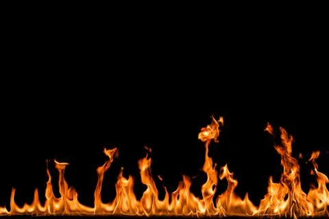 Fire flames on black background. Stock Photos