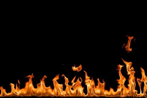 Fire flames on black background. Stock Photos