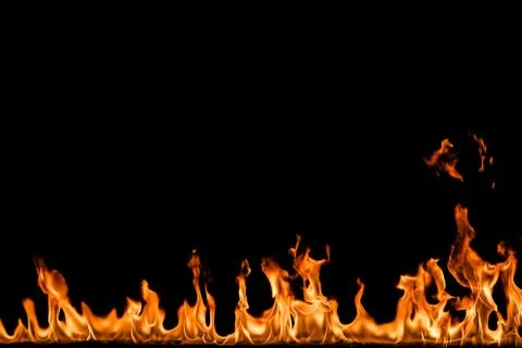 Fire flames on black background. Stock Photos
