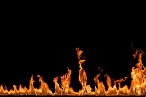 Fire flames on black background. Stock Photos