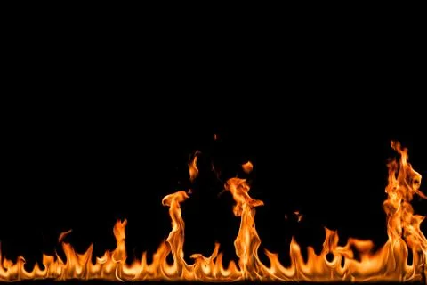 Fire flames on black background. Stock Photos